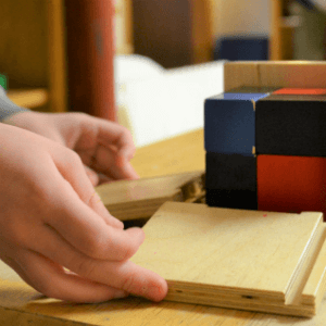 Kids hands working with blocks